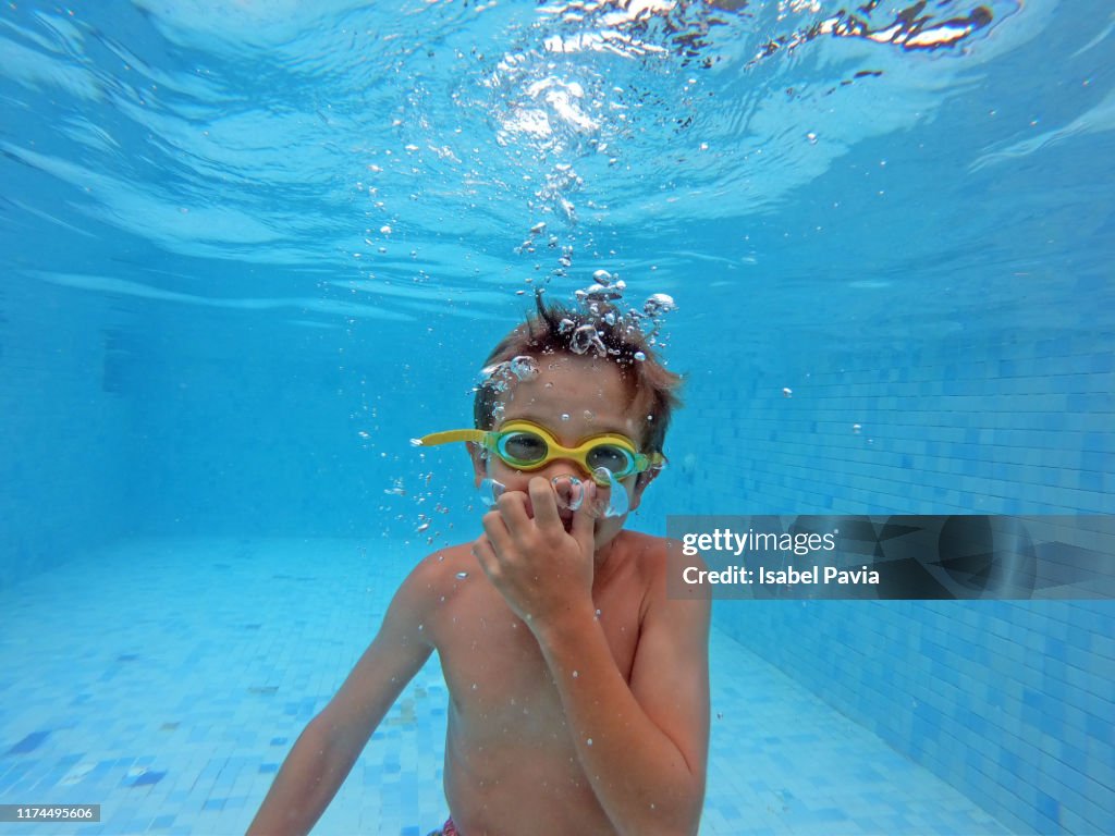 Underwater Shot Of Boy Swimming At Pool High Res Stock Photo Getty Images underwater-shot-of-boy-swimming-at-pool-high-res-stock-photo-getty-images