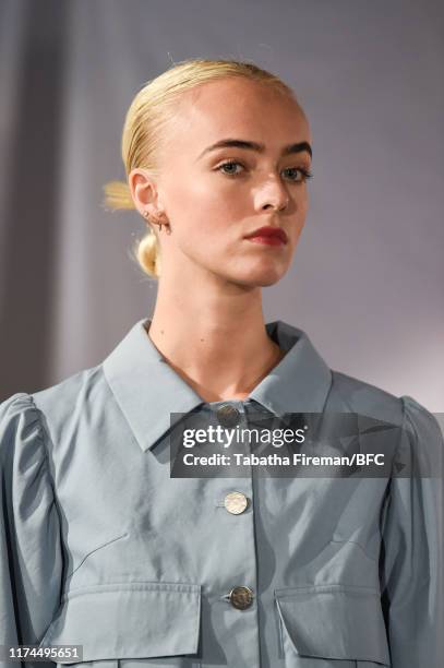 Model walks the runway at the Gayeon Lee show during London Fashion Week September 2019 at Foyles on September 13, 2019 in London, England.