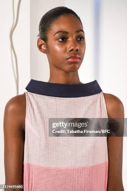 Model walks the runway at the Gayeon Lee show during London Fashion Week September 2019 at Foyles on September 13, 2019 in London, England.