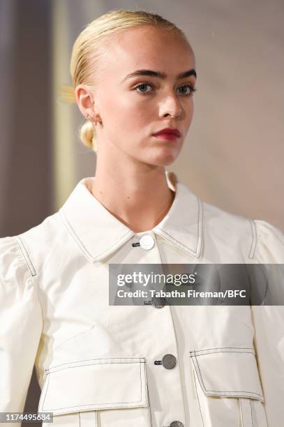 Model walks the runway at the Gayeon Lee show during London Fashion Week September 2019 at Foyles on September 13, 2019 in London, England.