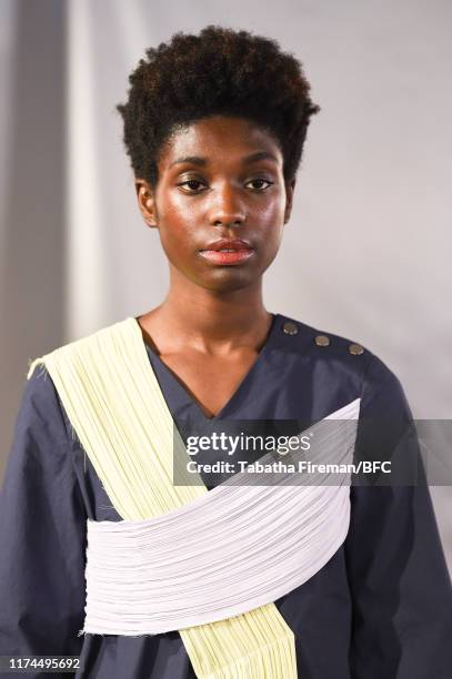 Model walks the runway at the Gayeon Lee show during London Fashion Week September 2019 at Foyles on September 13, 2019 in London, England.