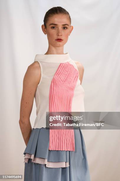 Model walks the runway at the Gayeon Lee show during London Fashion Week September 2019 at Foyles on September 13, 2019 in London, England.