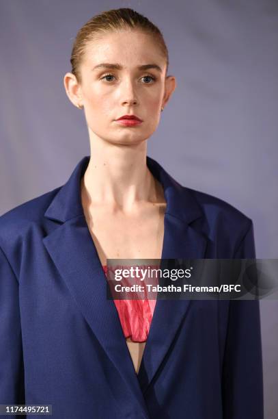 Model walks the runway at the Gayeon Lee show during London Fashion Week September 2019 at Foyles on September 13, 2019 in London, England.