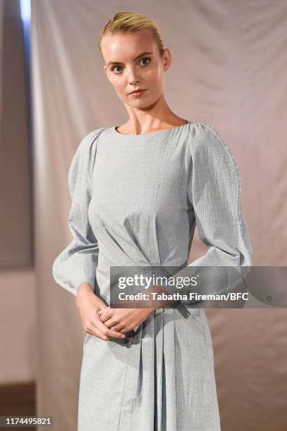 Model walks the runway at the Gayeon Lee show during London Fashion Week September 2019 at Foyles on September 13, 2019 in London, England.