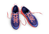 A side view of purple and orange Trainers