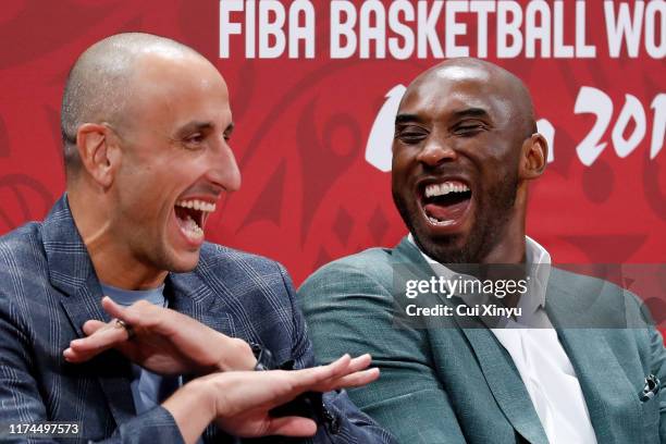 Former players Emanuel Ginobili Kobe Bryant react during the semi-finals march between Spain and Australia of 2019 FIBA World Cup at the Cadillac...