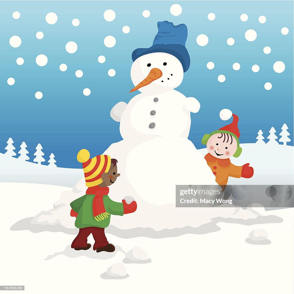 Cute kids making snowman