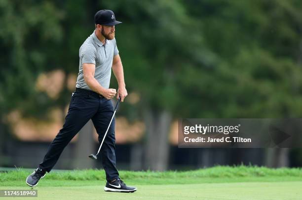Kevin Chappell reacts following his birdie putt on the seventh green during the second round of A Military Tribute At The Greenbrier held at the Old...