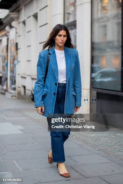 Deborah Reyner Sebag is seen wearing denim blazer and jeans outside Temperley London presentation during London Fashion Week September 2019 on...