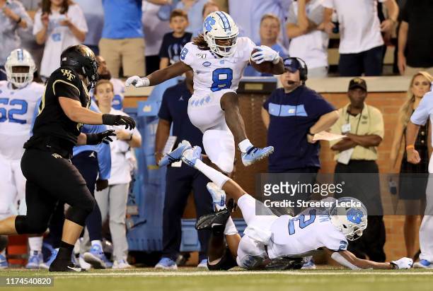 Michael Carter of the North Carolina Tar Heels runs with the ball against the Wake Forest Demon Deacons during their game at BB&T Field on September...