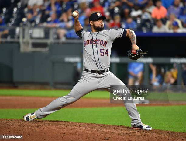 Roberto Osuna of the Houston Astros throws in the ninth inning against the Kansas City Royals at Kauffman Stadium on September 13, 2019 in Kansas...