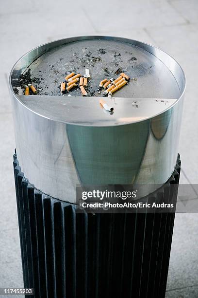 garbage can with cigarette butts - ashtray stock pictures, royalty-free photos & images