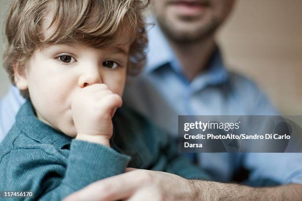 toddler boy sucking thumb, portrait - thumb sucking stock pictures, royalty-free photos & images