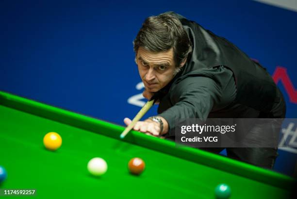 Ronnie O'Sullivan of England plays a shot in the semi-final match against Neil Robertson of Australia on day 6 of World Snooker Shanghai Masters 2019...