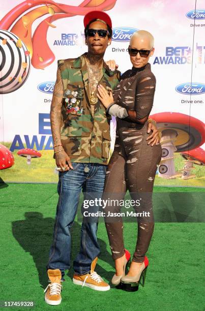 Rapper Wiz Khalifa and model Amber Rose arrive at the BET Awards '11 held at the Shrine Auditorium on June 26, 2011 in Los Angeles, California.