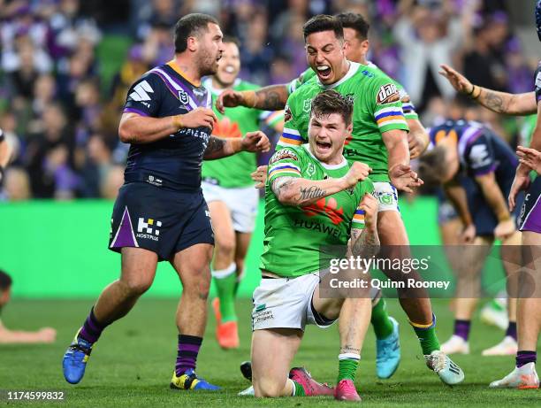 John Bateman of the Raiders is congratulated by team mates after scoring a try during the NRL Qualifying Final match between the Melbourne Storm and...