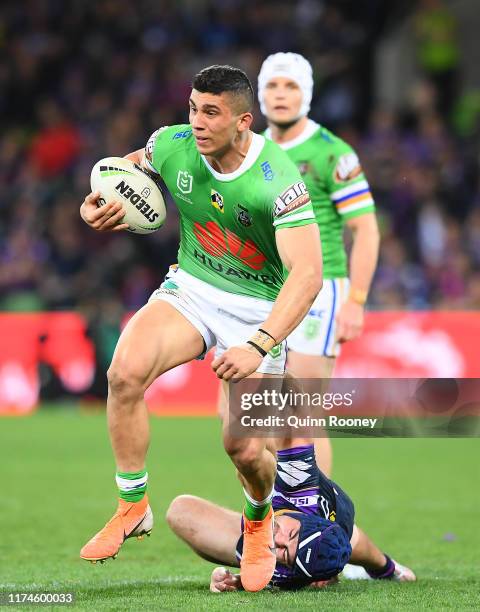 Bailey Simonsson of the Raiders is tackled during the NRL Qualifying Final match between the Melbourne Storm and the Canberra Raiders at AAMI Park on...