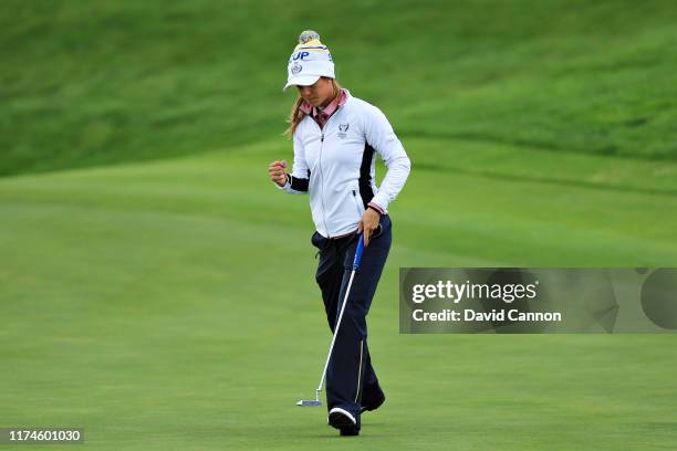 Azahara Munoz of Team Europe reacts to a putt on the second green during Day 2 of the Solheim Cup at Gleneagles on September 14, 2019 in...