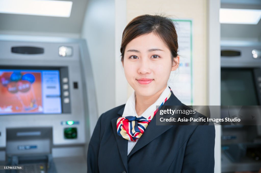 A Chinese bank teller and retail bank interior.