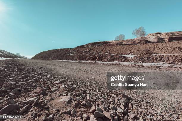 empty gravel road - dirt track stock pictures, royalty-free photos & images