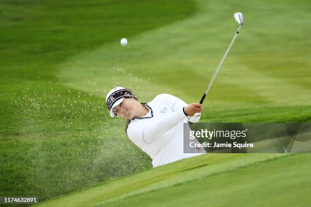 Angel Yin of Team USA plays her third shot on the eighth hole from a bunker during Day 2 of the Solheim Cup at Gleneagles on September 14, 2019 in...