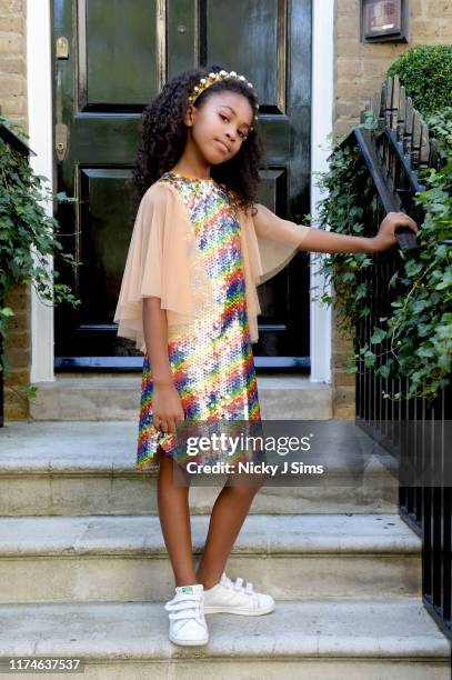 Model poses outside St. Mary's Church at the Melis Kapanpoglu Kids show on September 14, 2019 in London, United Kingdom.