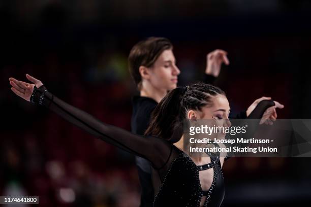 Elizaveta Shanaeva and Devid Naryzhnyy of Russia pose in the Junior Ice Dance medal ceremony during day 3 of the ISU Junior Grand Prix of Figure...