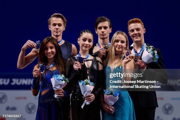 Diana Davis and Gleb Smolkin of Russia, Elizaveta Shanaeva and Devid Naryzhnyy of Russia, Nadiia Bashynska and Peter Beaumont of Canada pose in the...