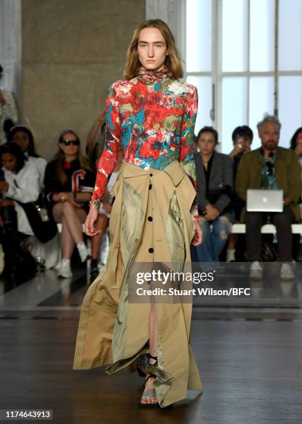 Model walks the runway at the TOGA show during London Fashion Week September 2019 at RIBA on September 14, 2019 in London, England.