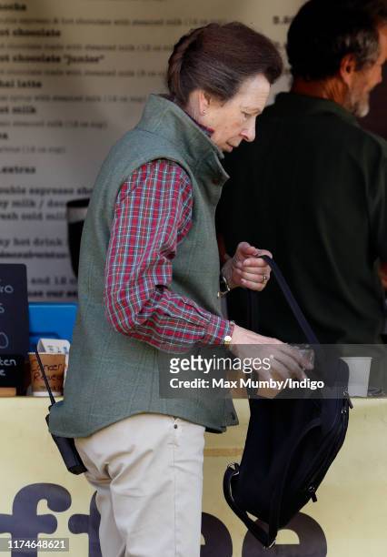 Princess Anne, Princess Royal queues up at a pop-up coffee shop as she attends day 2 of the Whatley Manor Gatcombe International Horse Trials at...
