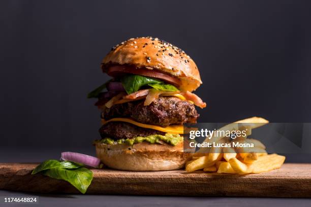 big cheese burger with fries - ハンバーグ　皿 ストックフォトと画像