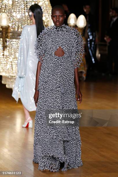 Model walks the runway at the Halpern show during London Fashion Week September 2019 on September 14, 2019 in London, England.