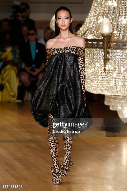 Model walks the runway at the Halpern show during London Fashion Week September 2019 on September 14, 2019 in London, England.