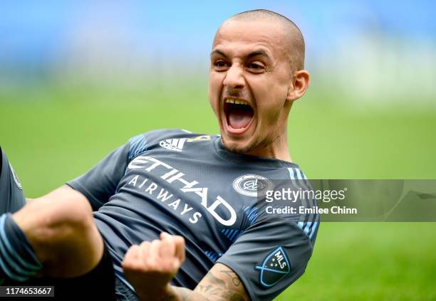 Alexandru Mitrita of New York City FC celebrates after scoring the second goal during the first half of their game against San Jose at Yankee Stadium...