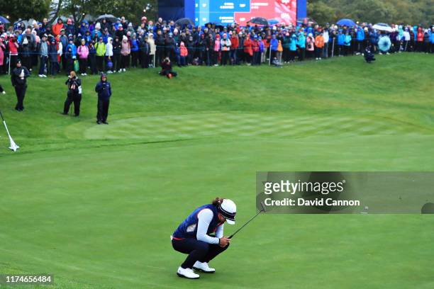 Marina Alex of Team USA reacts to a missed putt on the eighteenth green during Day 2 of the Solheim Cup at Gleneagles on September 14, 2019 in...