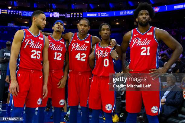 Ben Simmons, Tobias Harris, Al Horford, Josh Richardson, and Joel Embiid of the Philadelphia 76ers look on prior to the start of the preseason game...