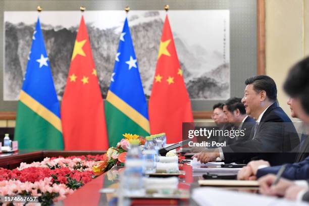 Chinese President Xi Jinping meets with Prime Minister Manasseh Damukana Sogavare of the Solomon Islands at the Diaoyutai State Guesthouse on October...