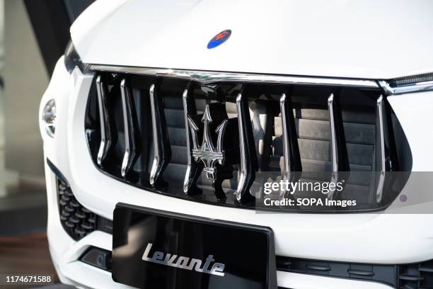 Italian luxury vehicle manufacturer, Maserati logo seen on a Levante SUV in Shanghai Pudong International Airport.