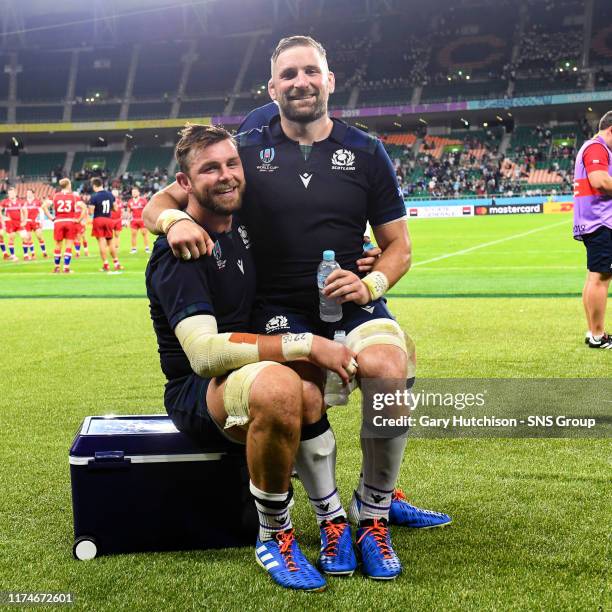 Scotlands Ryan Wilson and John Barclay at full time of the Rugby World Cup 2019 Pool A match between Scotland and Russia at the Shizuoka Stadium on...