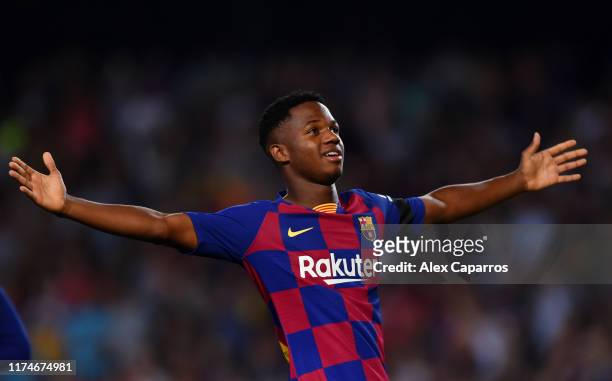 Anssumane Fati of Barcelona celebrates after scoring his team's first goal during the Liga match between FC Barcelona and Valencia CF at Camp Nou on...