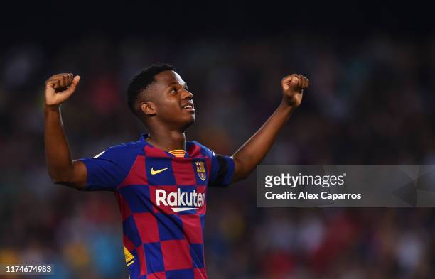 Anssumane Fati of Barcelona celebrates after scoring his team's first goal during the Liga match between FC Barcelona and Valencia CF at Camp Nou on...