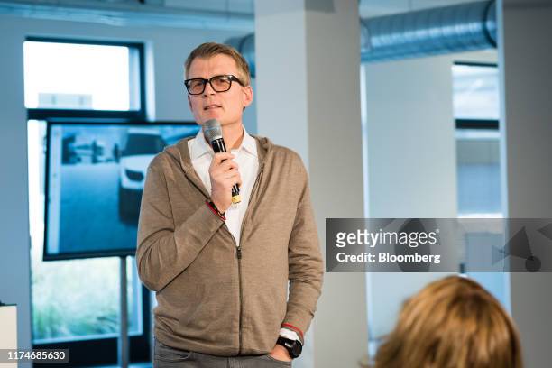 Joerg Sommer, chief executive officer of StreetScooter GmbH, speaks during the unveiling of the StreetScooter 'Work' cargo electric van at the...