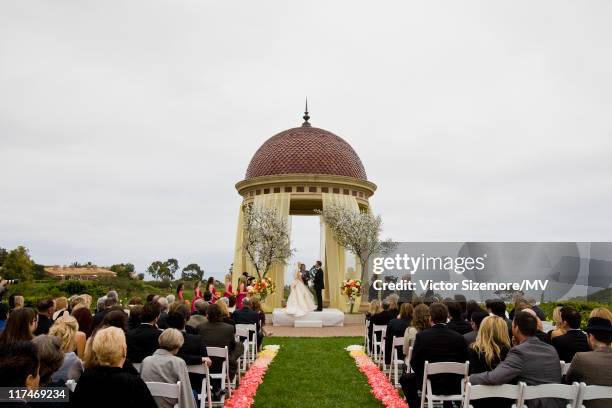 Michael Vartan and Lauren Skaar during their wedding at The Resort at Pelican Hill April 2, 2011 in Newport Beach, California. Lauren is wearing Vera...