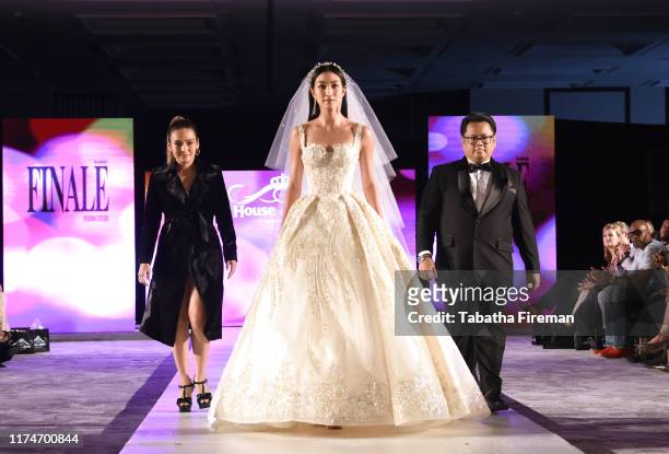 Designers walk the runway for Finale Wedding Studio at the House of iKons show at Hilton London Metropole on September 14, 2019 in London, England.