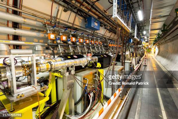 Part of complex Large Hadron Collider is seen underground during the Open Days at the CERN particle physics research facility on September 14, 2019...
