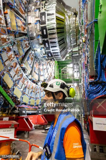 Guide explains to visitors about the CSR experiment during the Open Days at the CERN particle physics research facility on September 14, 2019 in...