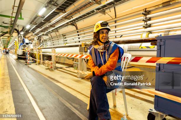 Volunteer is seen inside the LHC tunnels during the Open Days at the CERN particle physics research facility on September 14, 2019 in Meyrin,...