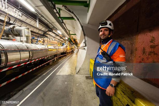 Volunteer is seen inside the LHC tunnels during the Open Days at the CERN particle physics research facility on September 14, 2019 in Meyrin,...