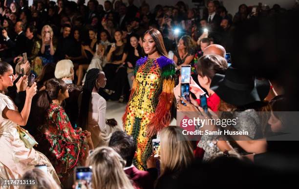 Naomi Campbell walks the runway at the Fashion for Relief show during London Fashion Week September 2019 on September 14, 2019 in London, England.