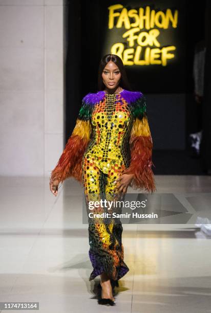 Naomi Campbell walks the runway at the Fashion for Relief show during London Fashion Week September 2019 on September 14, 2019 in London, England.